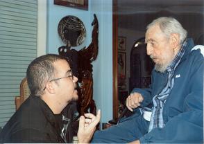 Fidel Castro y Randy Perdomo, presidente de la FEU de la Universidad de la Habana