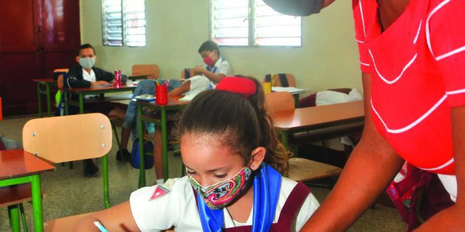 In diesem schwierigen Jahr waren die Lehrer vor die Aufgabe gestellt, mit einem neuen Lächeln zu unterrichten Photo: Ismael Batista